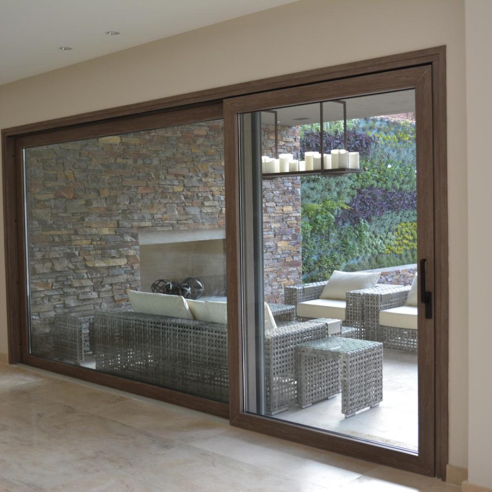 Obras Particulares 25 Abertura de PVC color premium Grey Oak