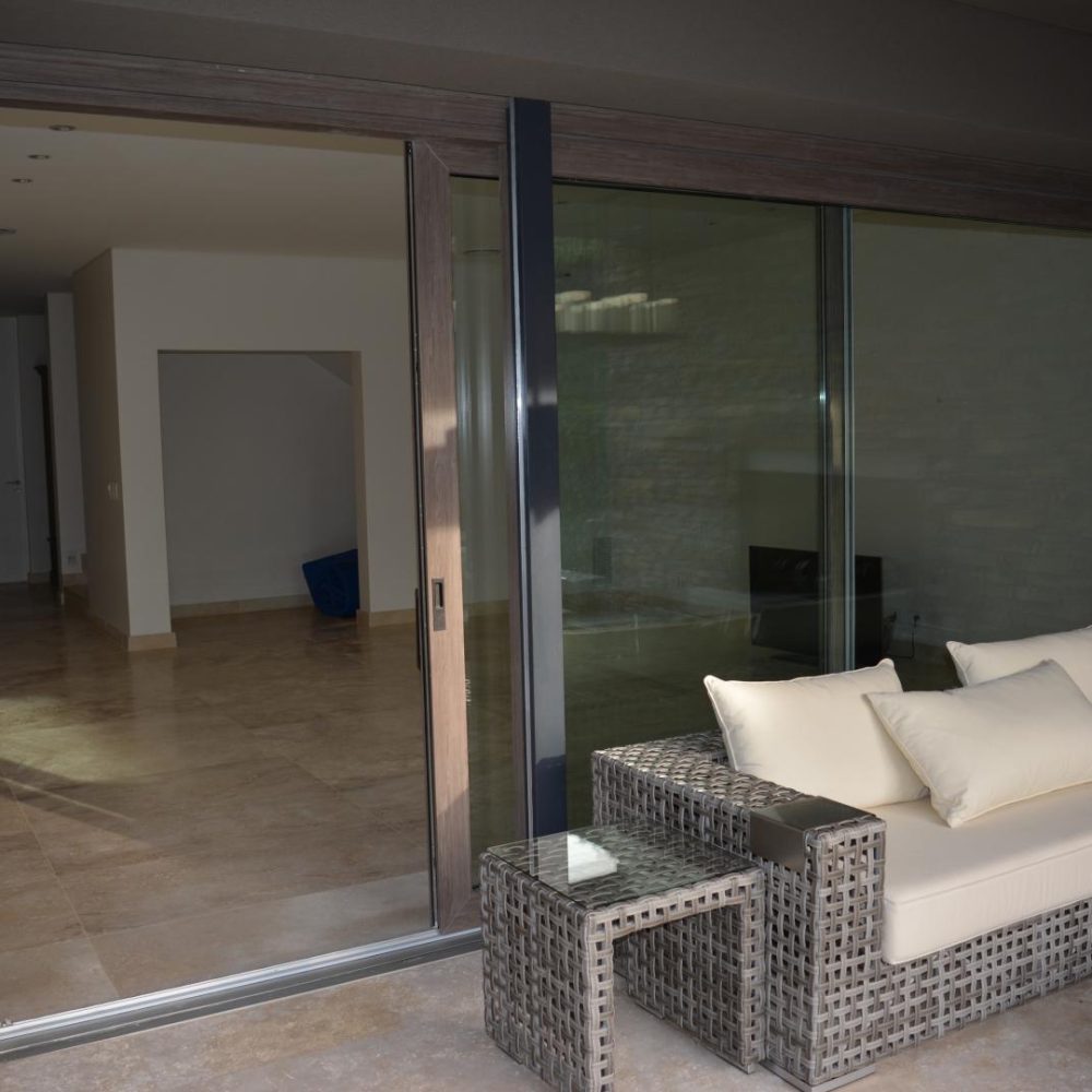 Obras Particulares 48 Abertura de PVC textura Grey Oak premium