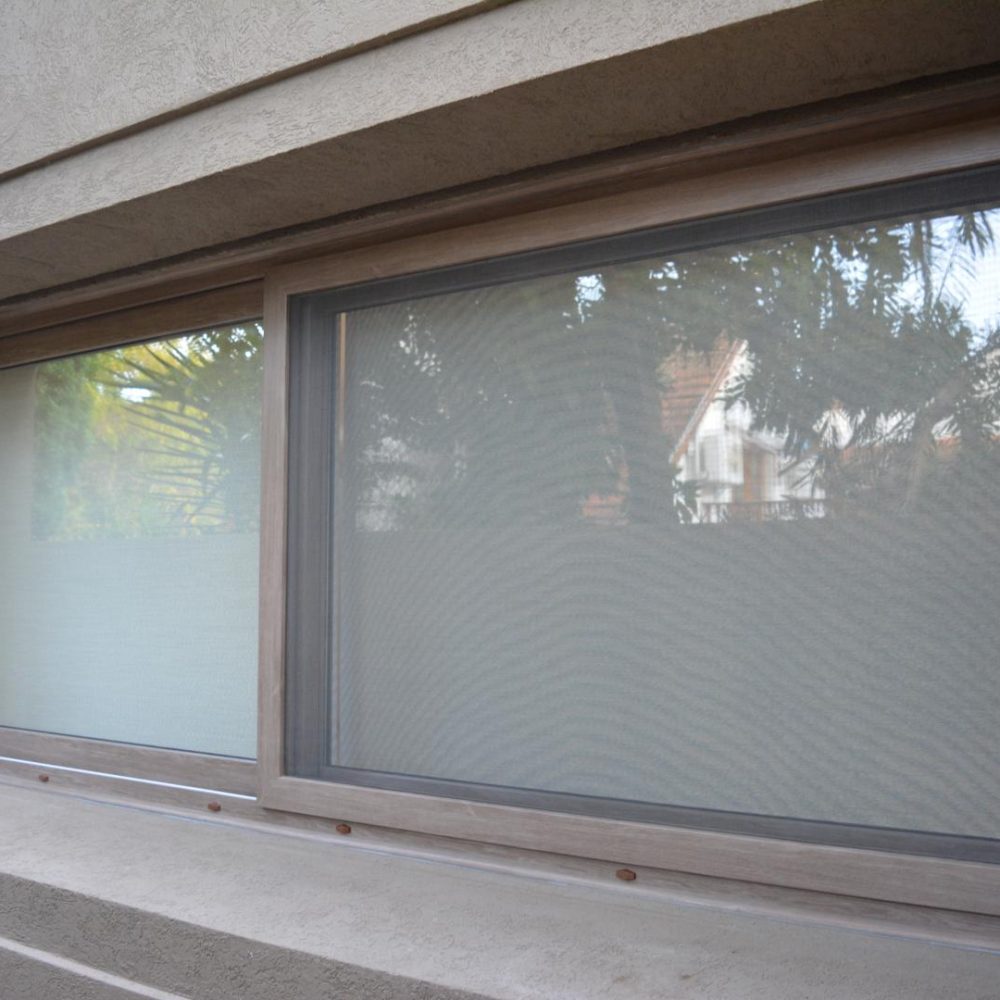 Obras Particulares 43 Abertura de PVC textura Grey Oak para vivienda