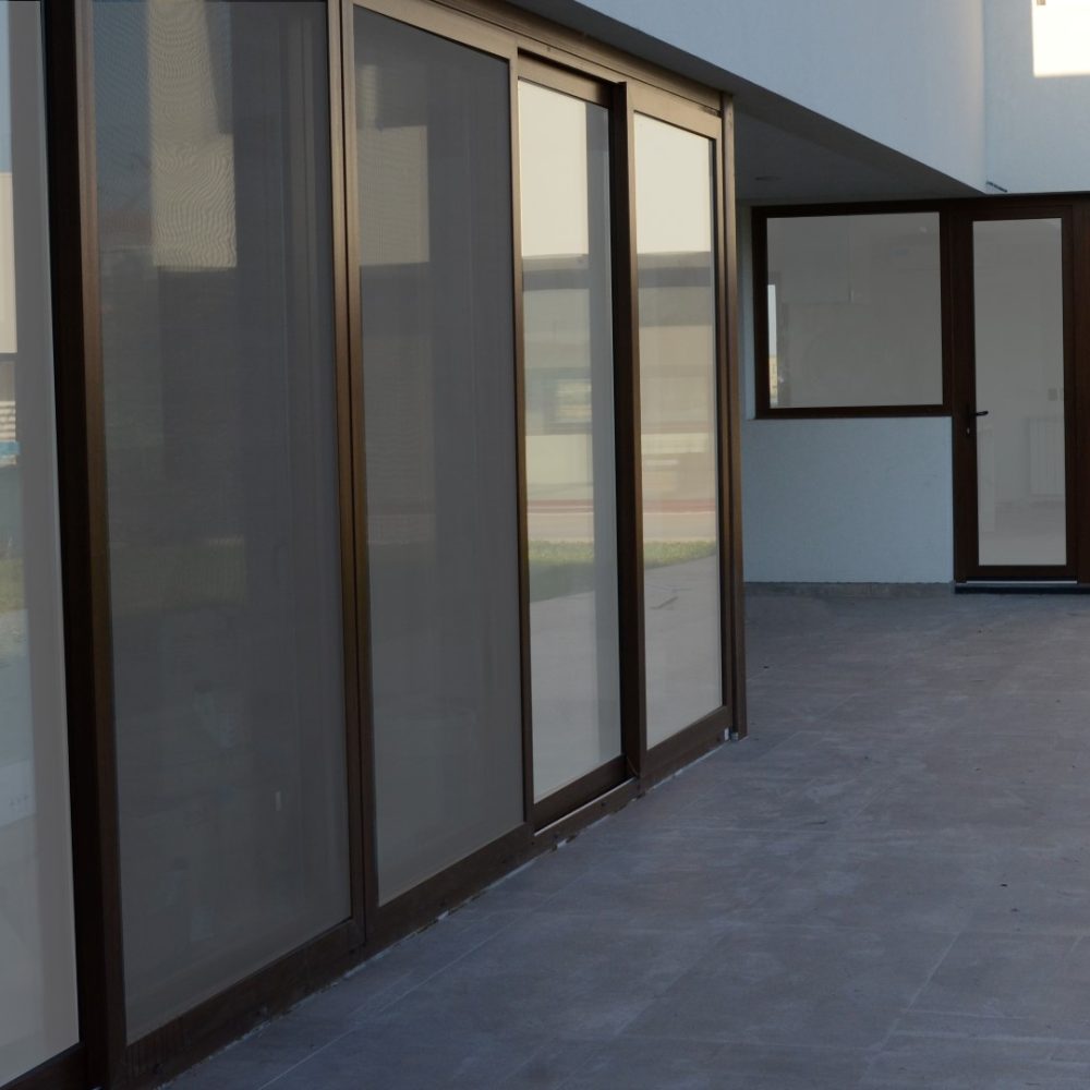 Obras Particulares 32 Abertura de PVC DVH textura Nogal para vivienda