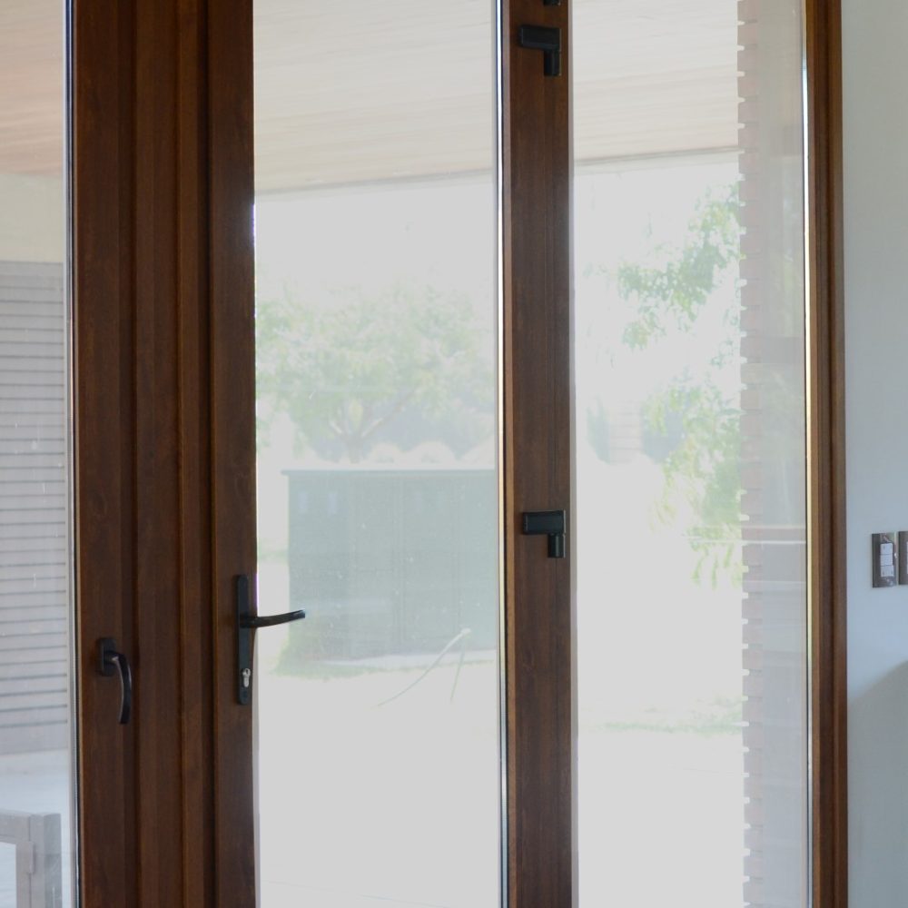 Obras Particulares 35 Ventana de PVC textura Nogal para vivienda