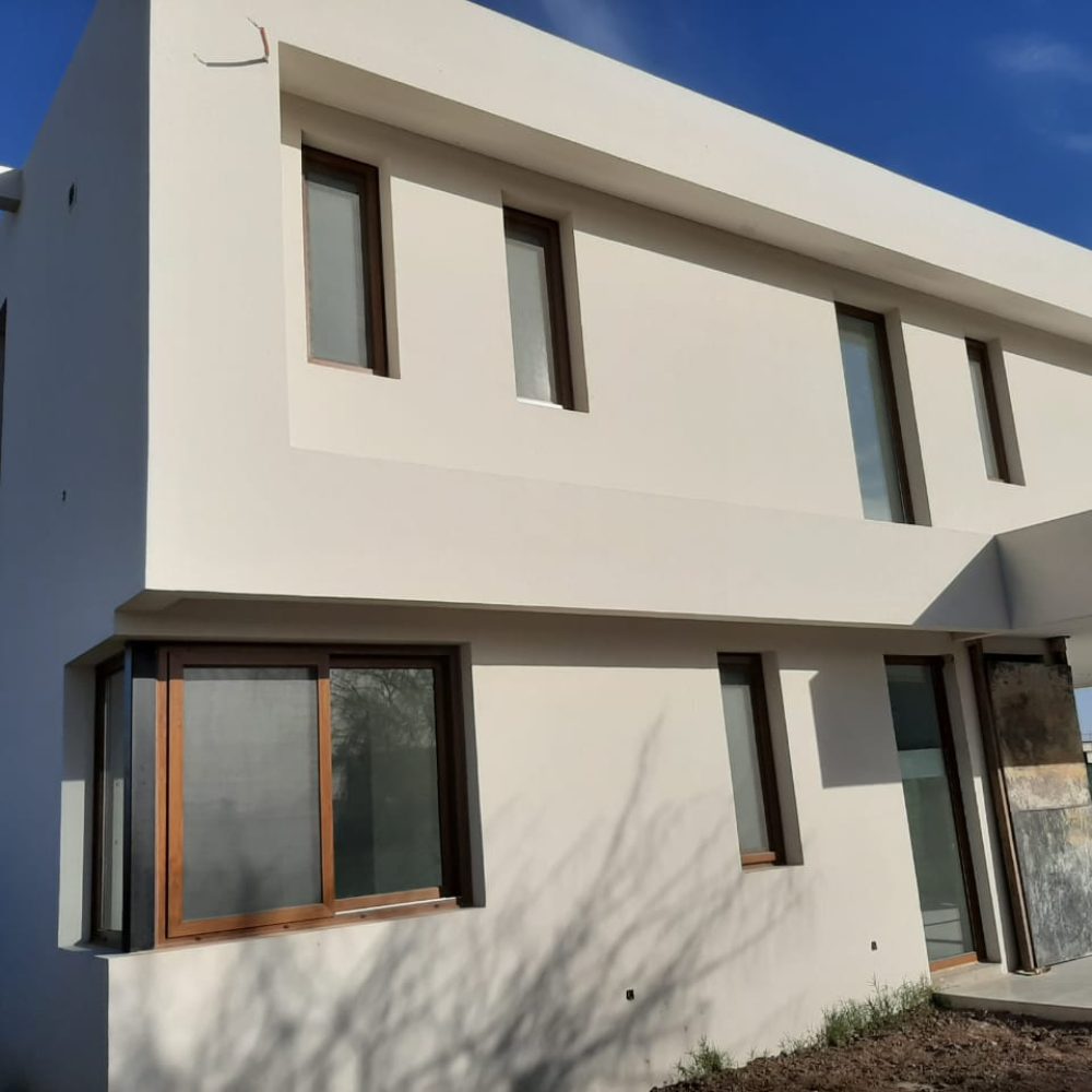 Obras Particulares 30 Abertura de PVC textura Nogal para vivienda